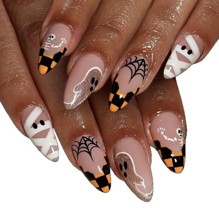 Halloween nail art kit featuring black polish, glitter, ghost & spider web stickers for spooky women's manicure.