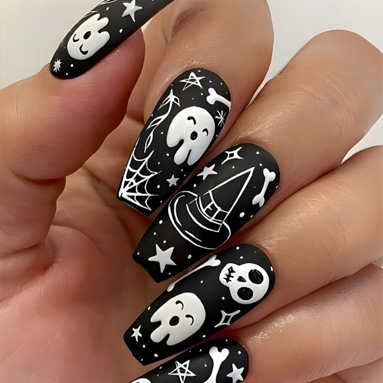 Women's spooky Halloween press-on nails featuring various festive designs like ghosts & skulls. Perfect for parties.