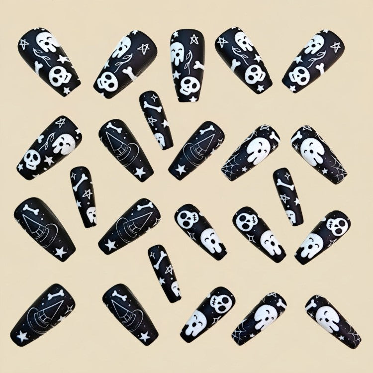 Vibrant women's Halloween nail art tips with spooky ghosts, skulls, and spider webs. Quick & easy press-on false nails.