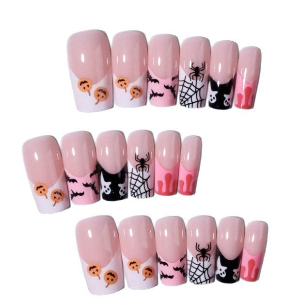 Full set of spooky Halloween press-on nails for women. Ghostly designs, perfect for festive costumes & parties.