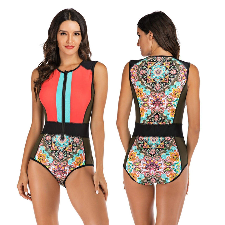 Detail shot of the sporty neckline and comfortable straps on women's one-piece athletic swimwear. Flattering fit.