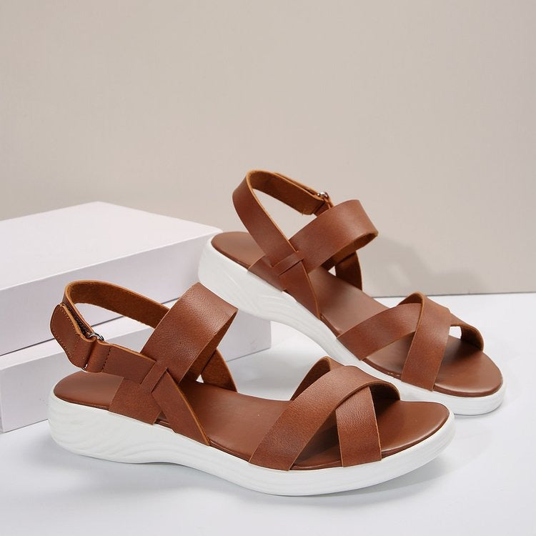 Women's sporty platform sandals, ideal for all-day walking comfort and casual summer style. Available in various colors.