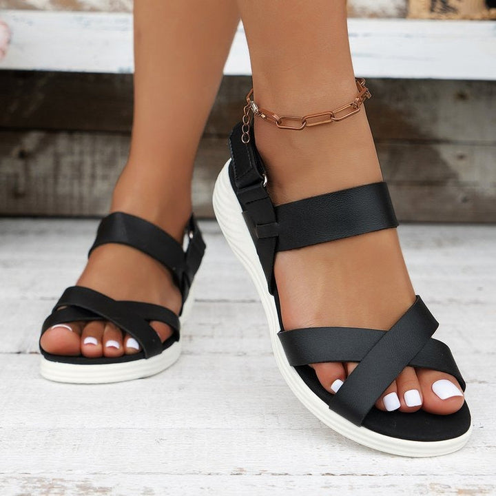 Comfortable women's sporty platform sandals in brown, white, or black. Chic walking sandals for stylish summer footwear.