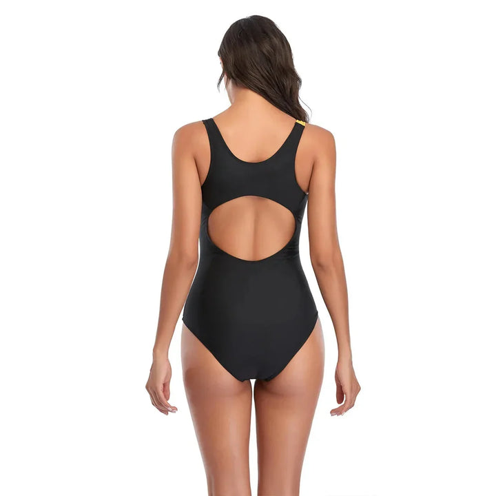 Flattering women's shaping swimwear, a sporty one-piece designed for comfort & summer style.