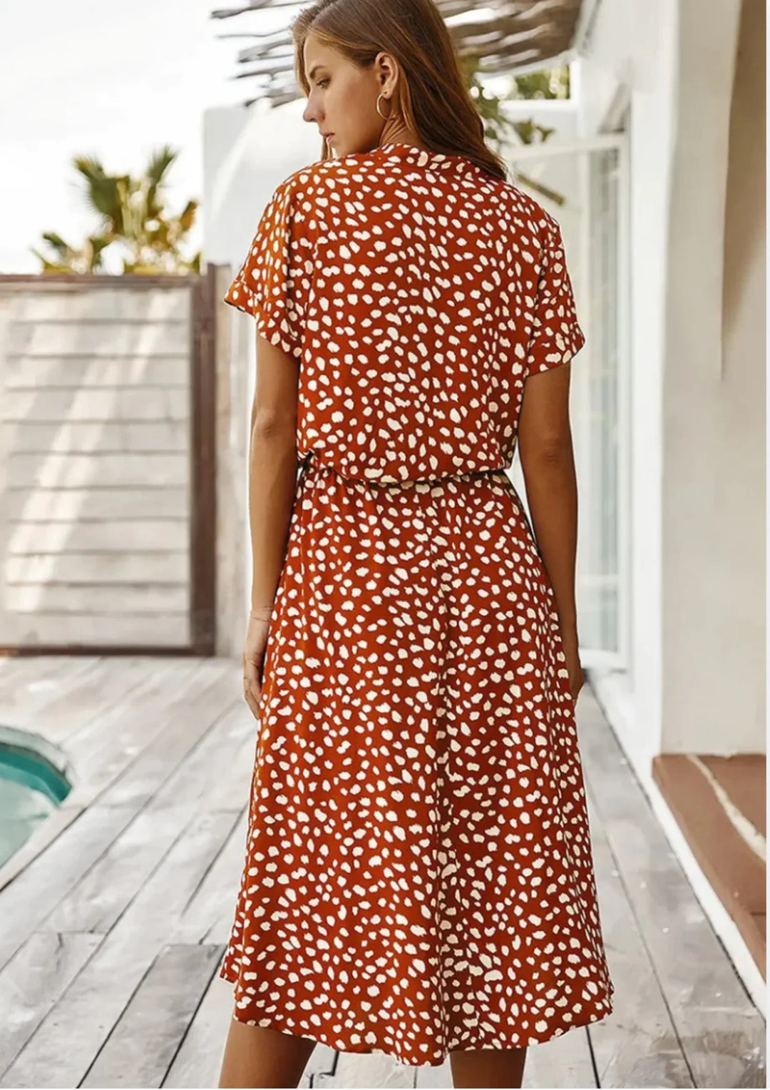 Lightweight spotted print midi dress for summer, featuring a button-down closure and adjustable drawstring.