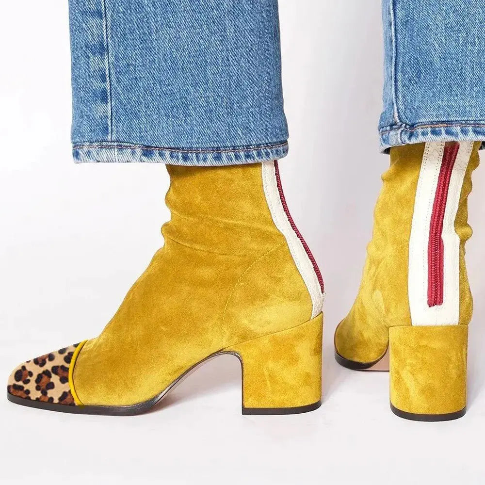 Women's square toe block heel ankle boots for effortless style. Versatile fall/winter fashion.