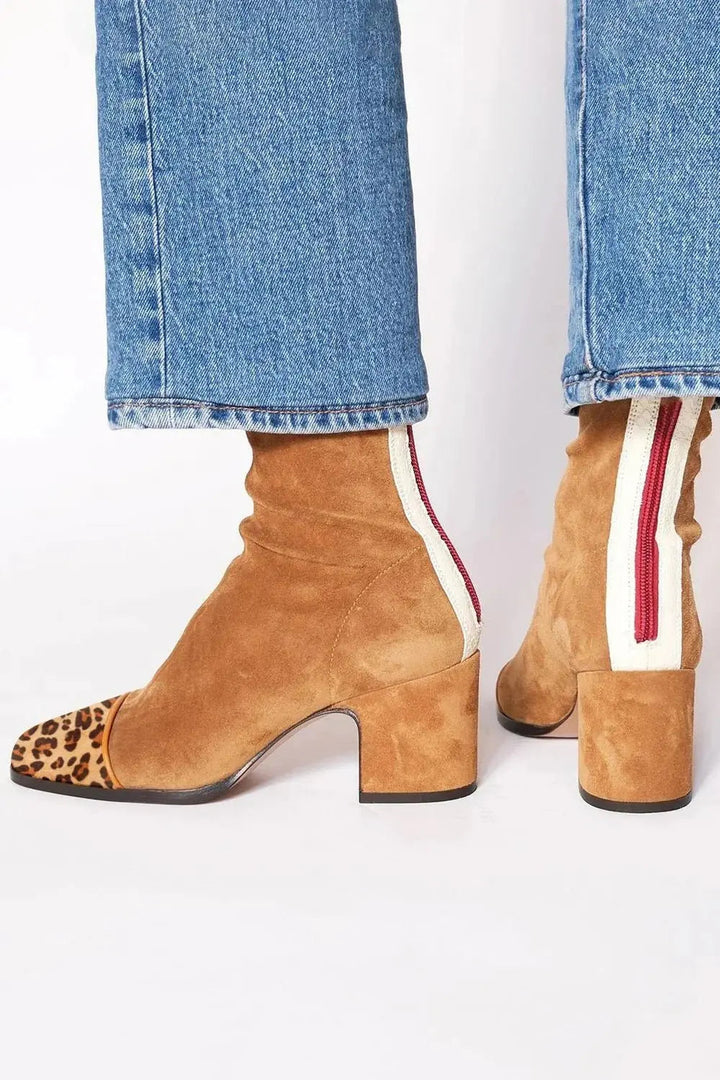 Comfortable women's square toe ankle boots with a stable block heel, ideal for everyday elegant style.