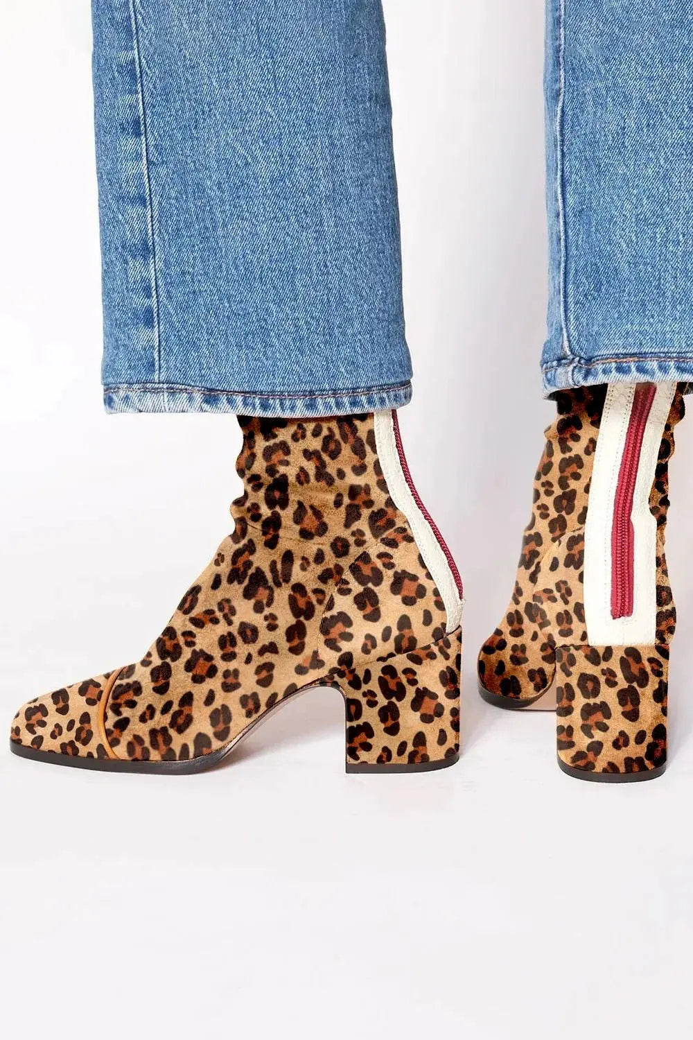 Trendy women's black square toe block heel ankle boots, a fall/winter fashion essential for women.