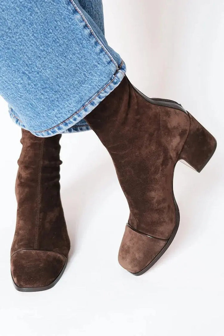 Versatile women's square toe block heel ankle boots, offering stylish comfort for any seasonal look.