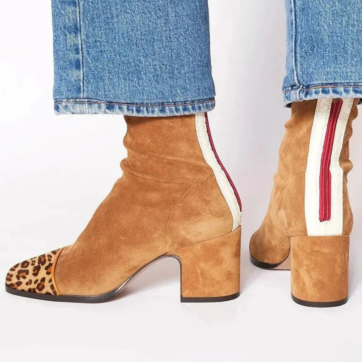 Elegant women's square toe block heel ankle boots, combining contemporary style with superior comfort.