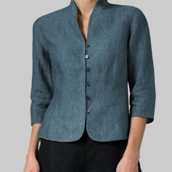 Versatile women's stand-collar blouse, ideal for office or casual styling. Features three-quarter sleeves.