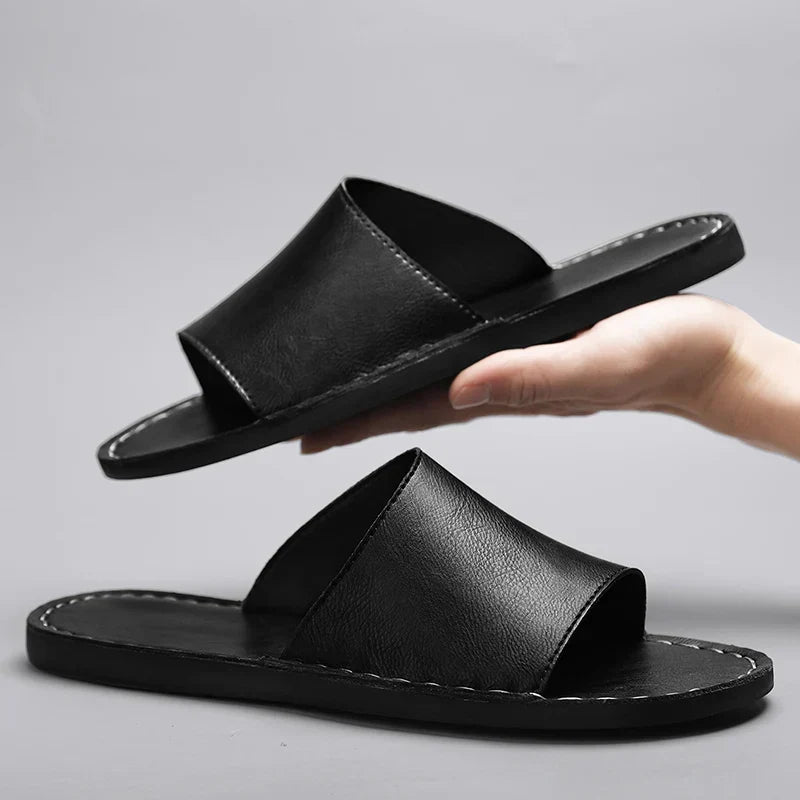 Versatile women's flat open-toe sandals with stitching. Easy slip-on comfort for casual summer outings.