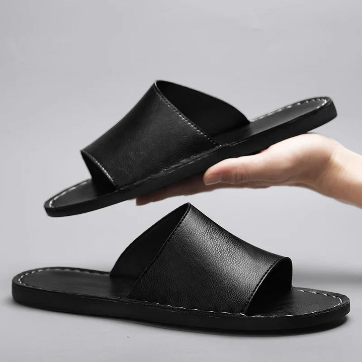 Versatile women's flat open-toe sandals with stitching. Easy slip-on comfort for casual summer outings.