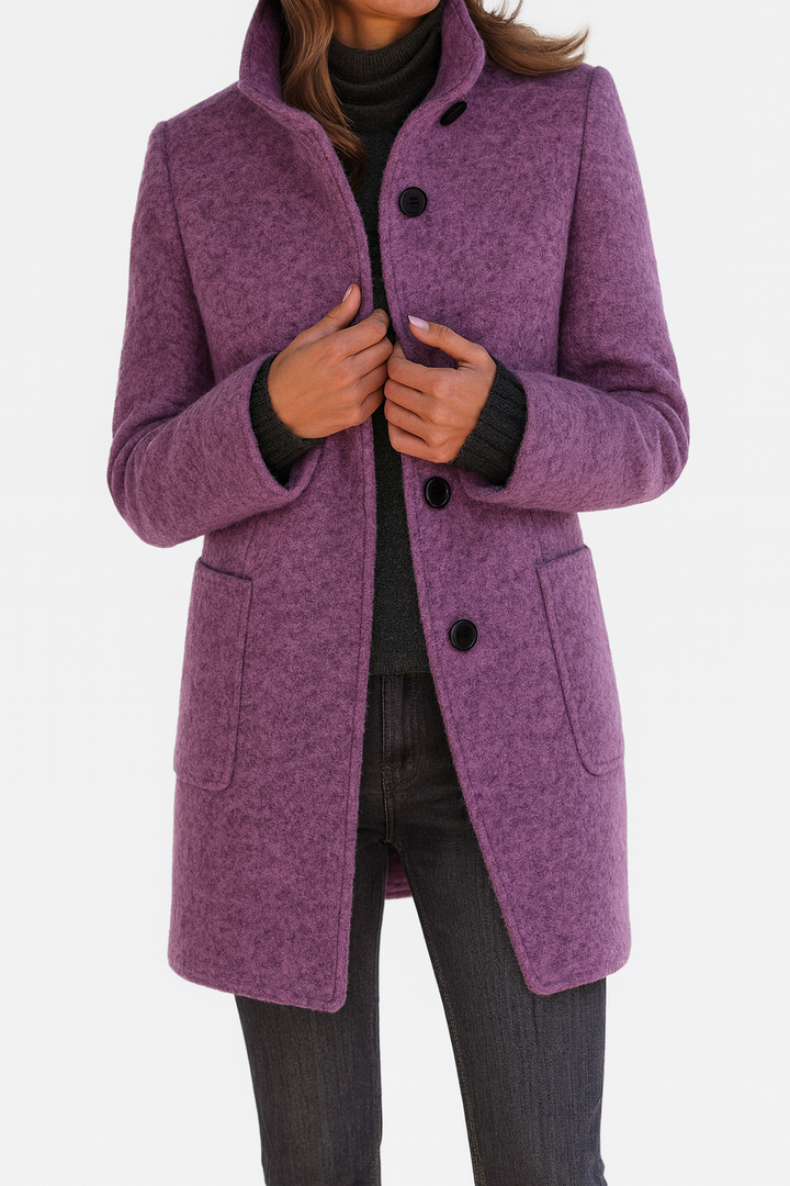 Mid-length straight cut women's coat with button closure & patch pockets, ideal for fall/winter fashion.