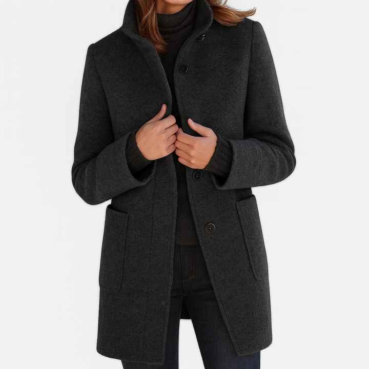 Classic straight cut women's mid-length coat, featuring a button-front closure for timeless fall fashion.
