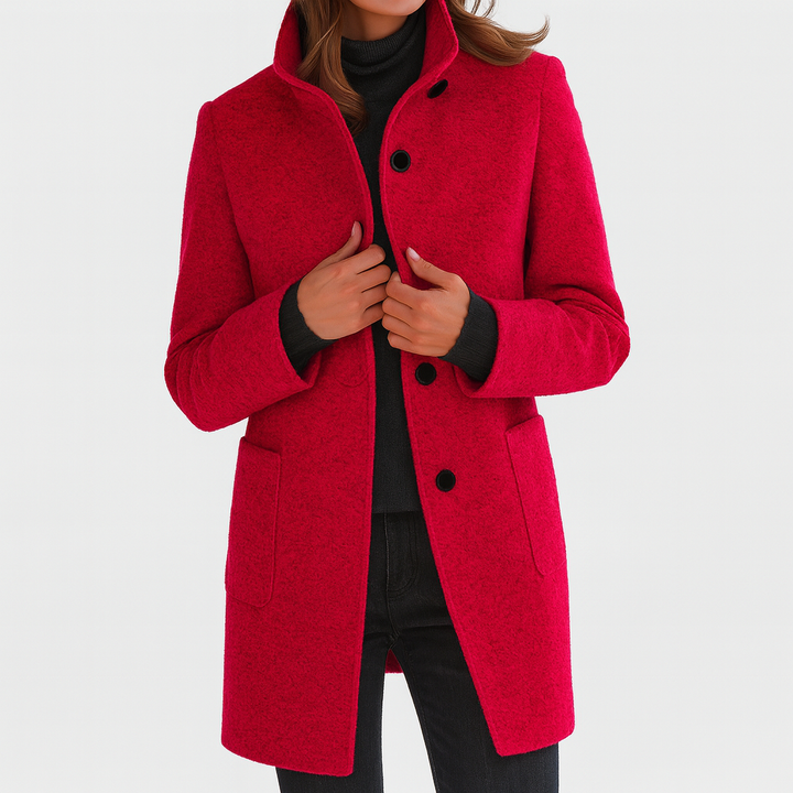 Women's mid-length straight cut coat with practical button front and patch pockets, great for winter style.