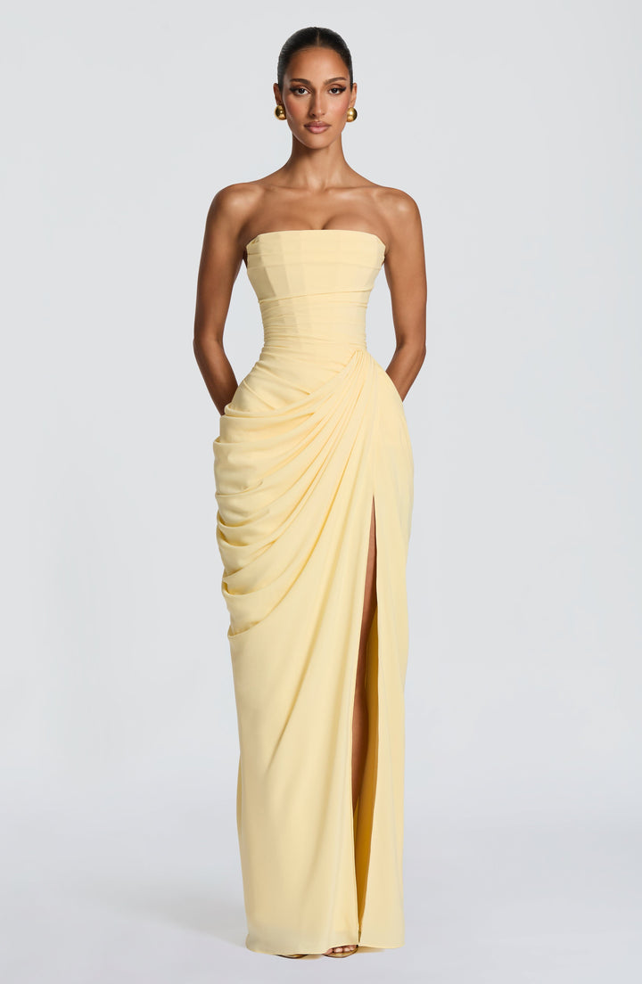 Sleek strapless evening maxi dress for women, with a modern bodycon fit & elegant corset detailing.
