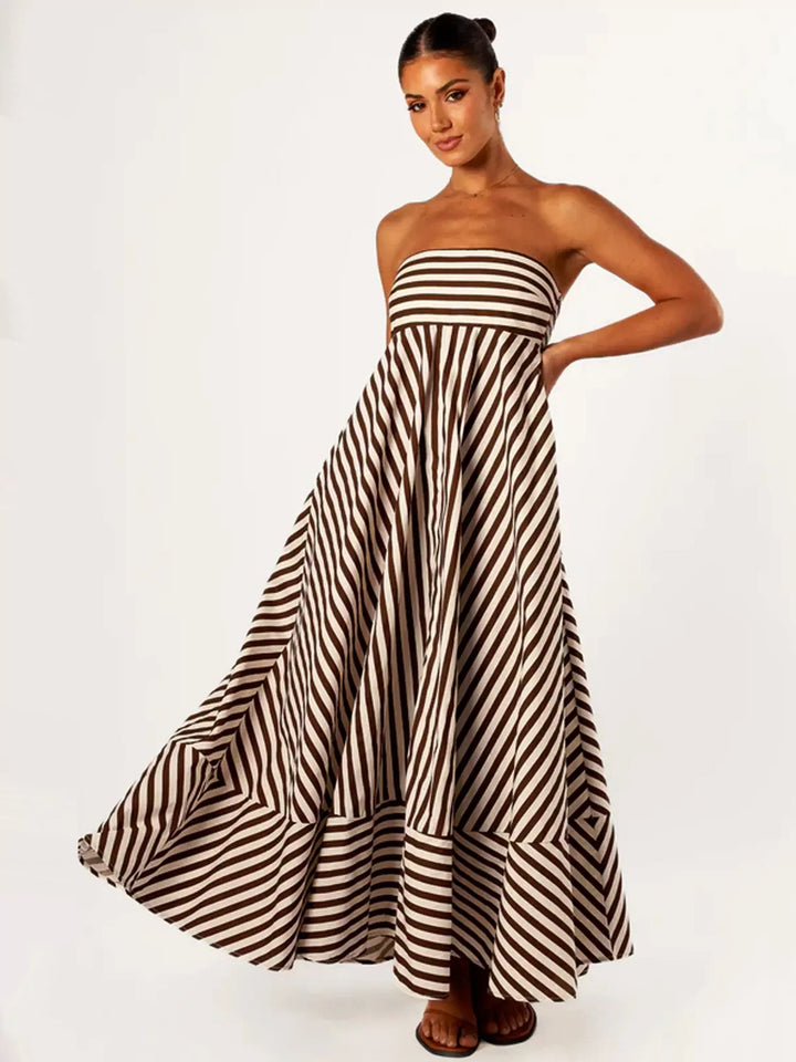 Stylish women's strapless maxi dress with diagonal stripes, ideal for summer parties & holiday wear.
