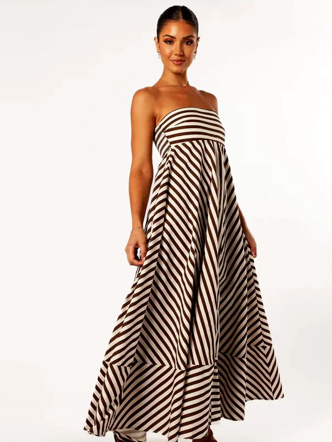 Versatile women's strapless maxi dress with diagonal stripes, suitable for casual chic or evening.