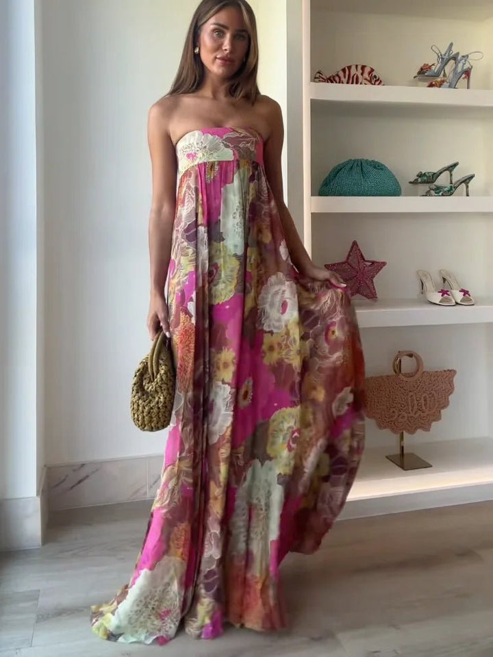 Elegant strapless maxi dress for women featuring a beautiful floral print, ideal for wedding guests & formal occasions.