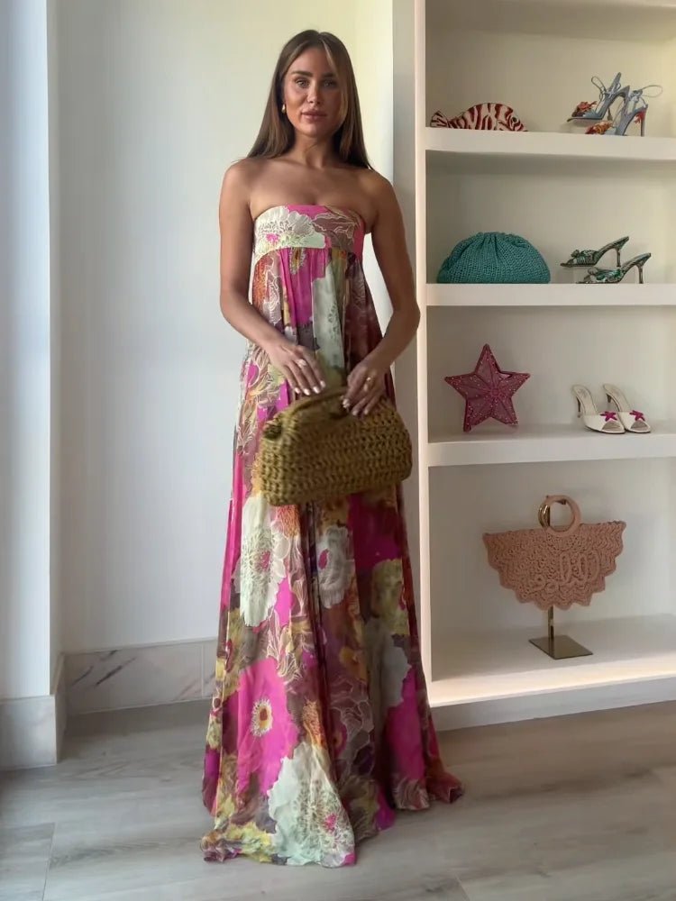 Feminine strapless floral print evening gown, a chic maxi dress for wedding guests, parties, or special occasions.