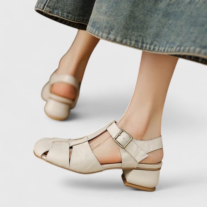 Fashionable women's strappy square toe sandals with a comfortable block heel. Ideal for summer elegance.