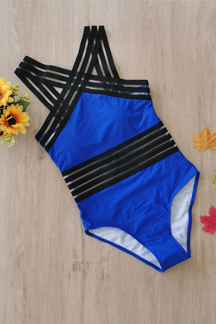 Summer essential women's monokini swimsuit, unique crossed design for a stylish look.