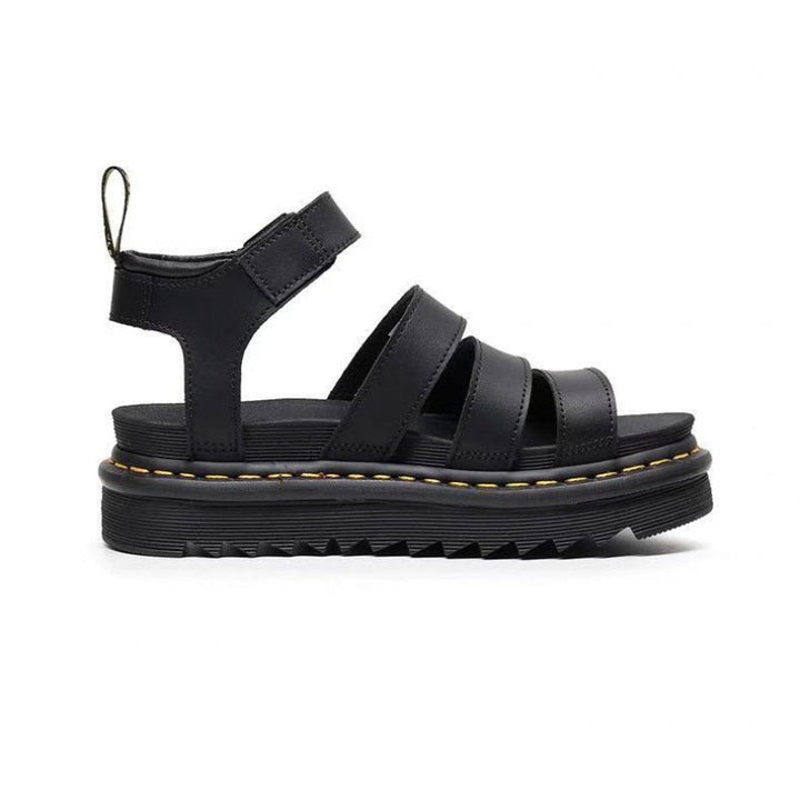 Elevated women's strappy platform sandals with a chunky sole & buckle, fashionable for summer.