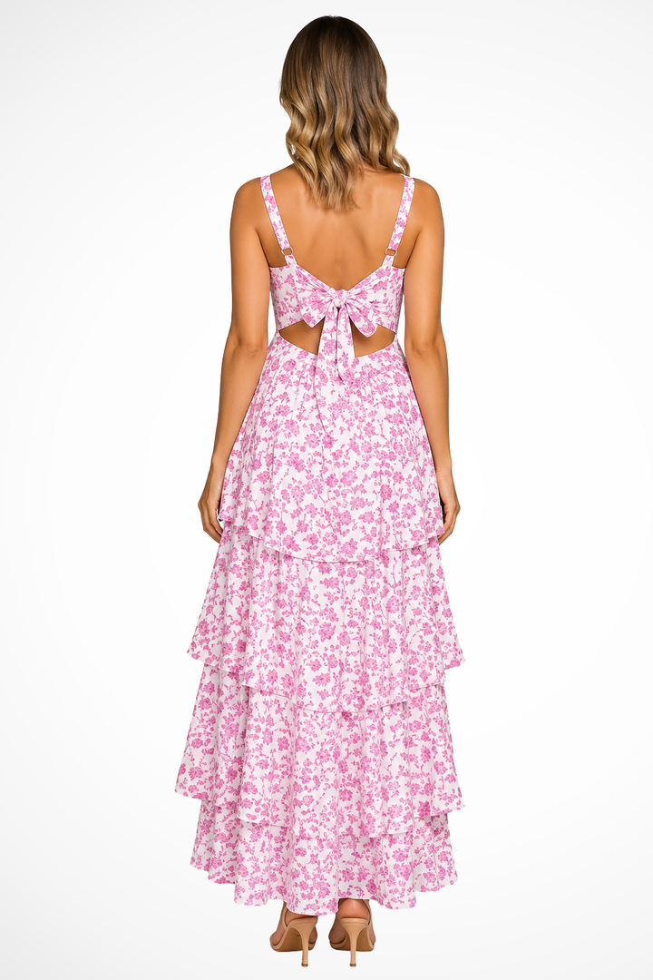 Long floral print strappy maxi dress for women, with tiered ruffles. Ideal elegant party or wedding guest dress.