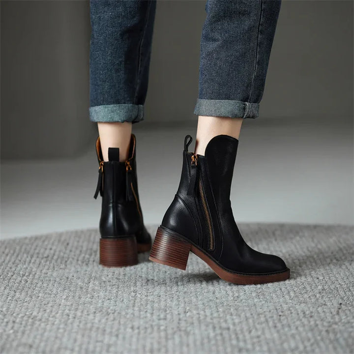 Comfortable black ankle boots for women, offering a streamlined look and effortless wear for any occasion.