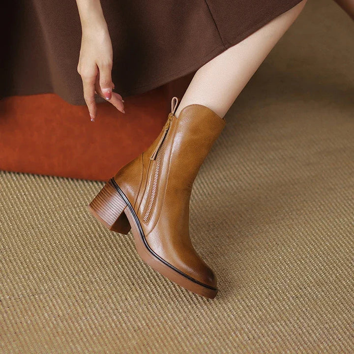 Stylish women's brown ankle boots, a versatile fashion choice with a streamlined silhouette for everyday comfort.