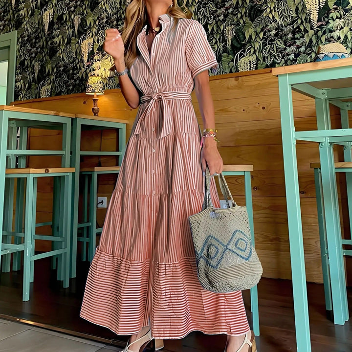 Comfortable women's striped button-down maxi dress. Tiered A-line design, tie-waist. Great for casual summer.