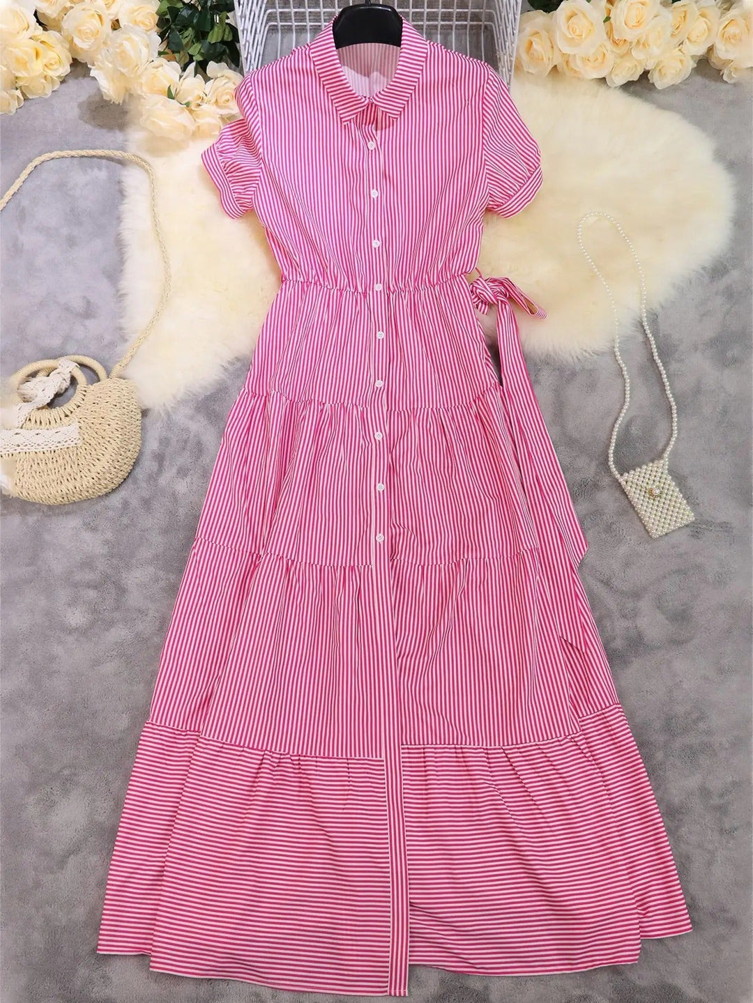 Chic women's A-line striped tiered maxi dress with a button-down front, polo collar & tie-waist for summer.