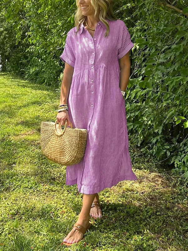 Elegant women's striped midi dress with a button-up front, suitable for effortless spring/summer fashion.