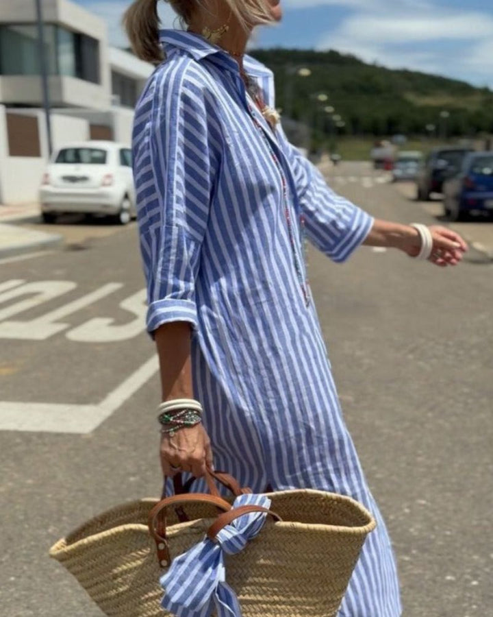 Trendy striped button-front midi shirt dress for women, great for summer fashion, casual outings & travel.