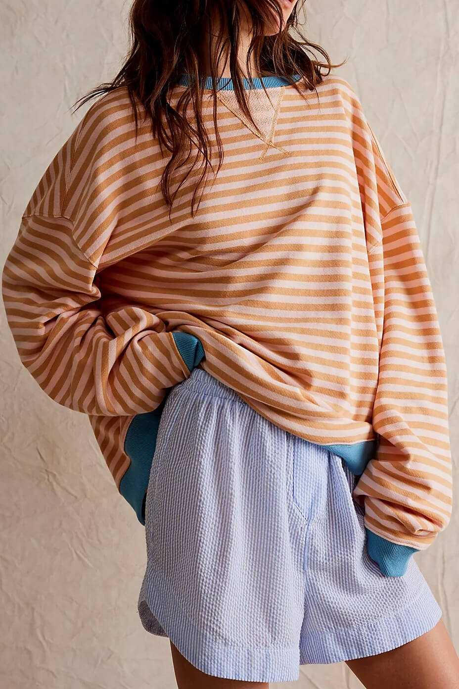 Women's striped crewneck sweater, a comfortable and casual pullover for effortless everyday style.
