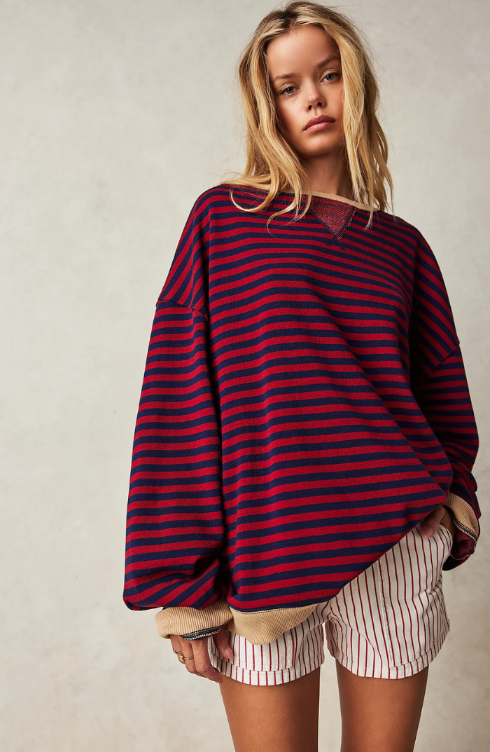 Comfortable women's striped crewneck sweater, an essential pullover for versatile, everyday fashion.