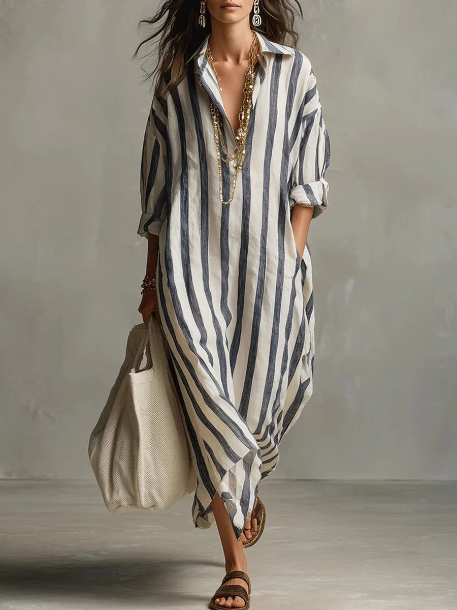 Women's striped flowy midi shirt dress with V-neck & three-quarter sleeves, perfect for casual summer style.