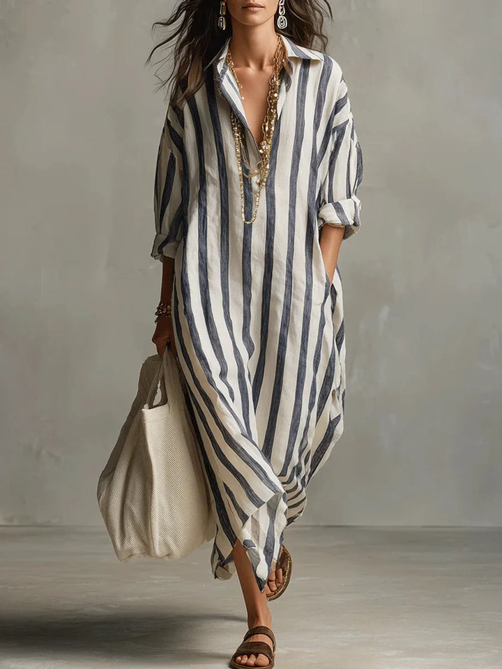 Women's striped flowy midi shirt dress with V-neck & three-quarter sleeves, perfect for casual summer style.