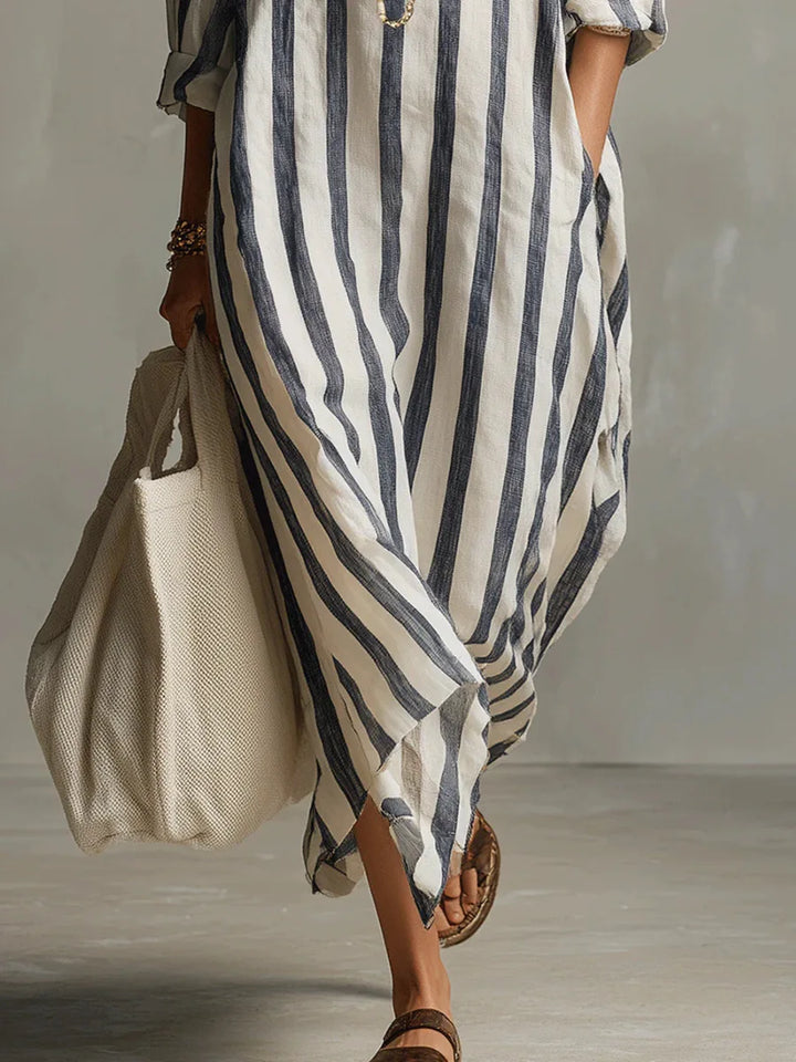 Casual summer women's flowy midi dress, striped, with a shirt collar design and comfortable three-quarter sleeves.