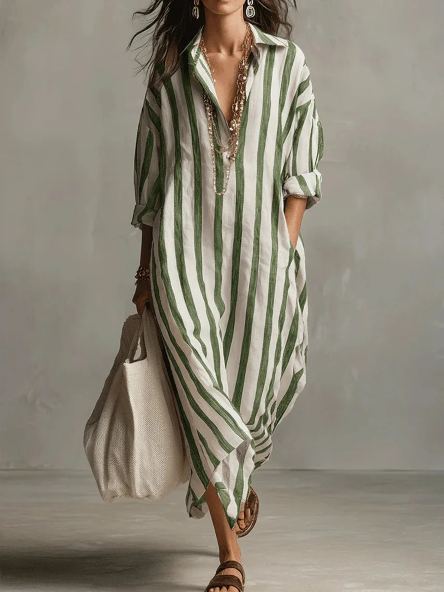 Lightweight women's flowy midi shirt dress with classic stripes, a V-neck, and comfortable three-quarter sleeves.