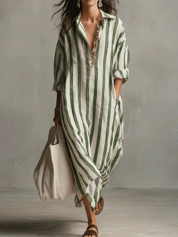 Lightweight women's flowy midi shirt dress with classic stripes, a V-neck, and comfortable three-quarter sleeves.