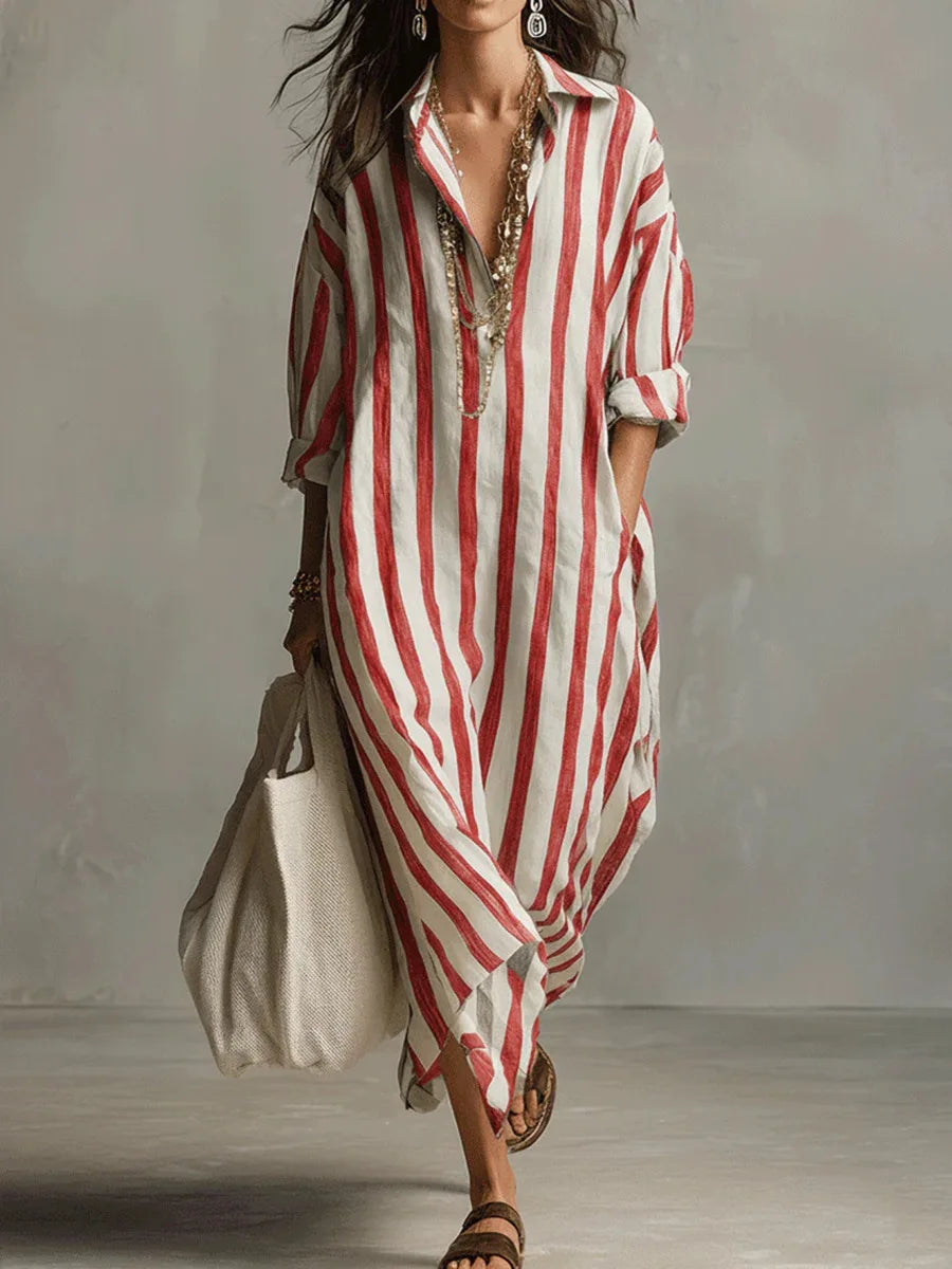 Relaxed fit women's striped midi shirt dress, flowy and comfortable, featuring a V-neck and three-quarter sleeves.