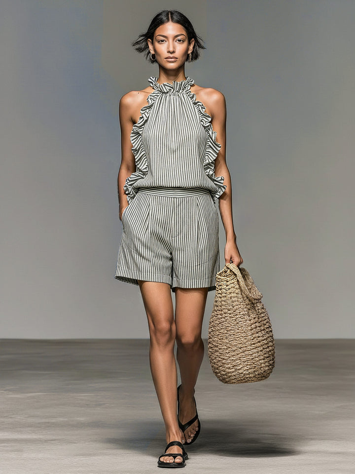 Stylish women's two-piece striped halter shorts set. Ideal summer resort wear with playful ruffle details, casual chic.