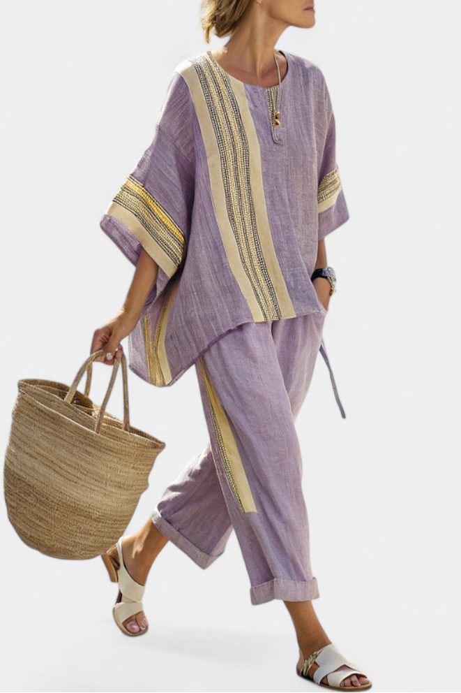 Two-piece women's striped linen blend tunic and capri set, ideal for casual summer outfits.
