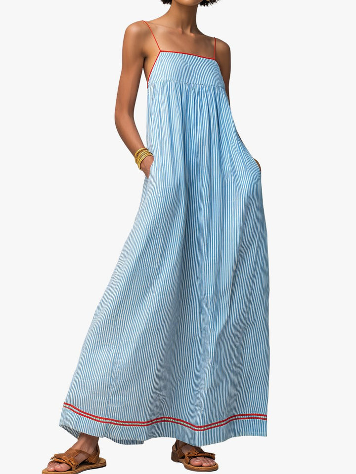 Women's striped maxi dress with pockets, perfect for summer style.