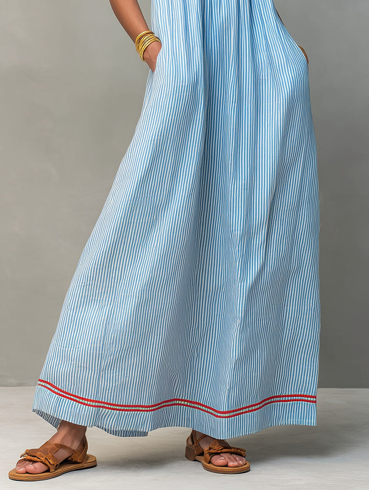 Casual yet elegant striped maxi dress with pockets, a must-have for versatile summer looks.