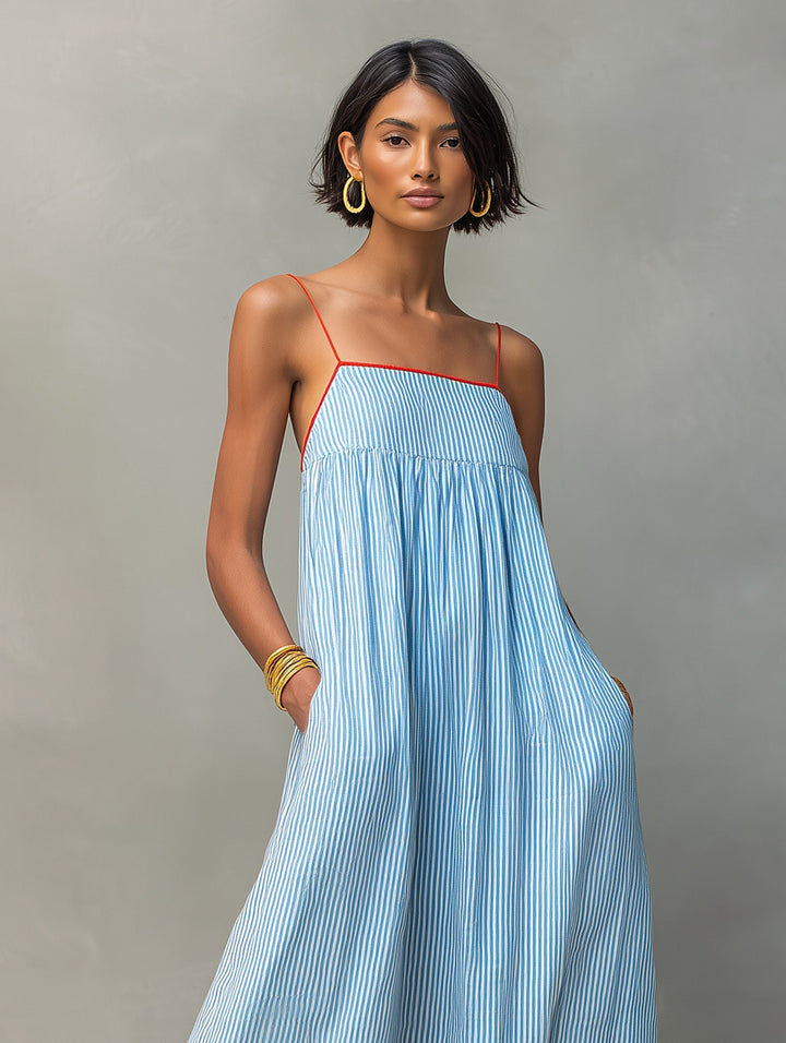 Lightweight flowy striped maxi dress with pockets, a breezy choice for summer fashion.