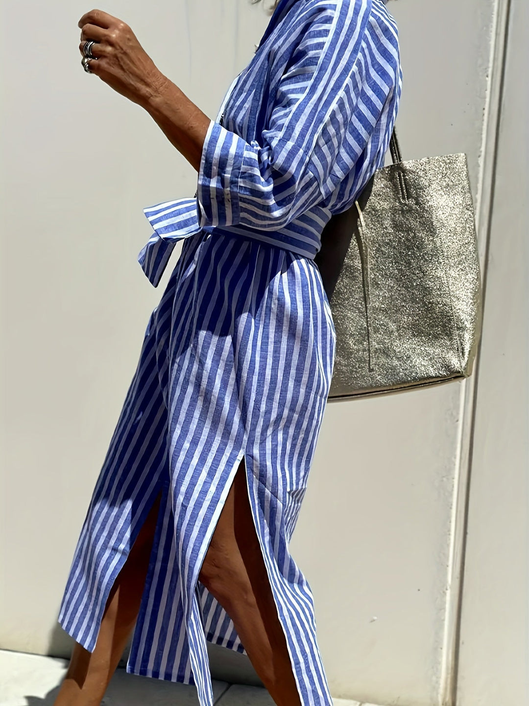 Chic women's striped belted shirt dress, perfect for casual summer fashion.