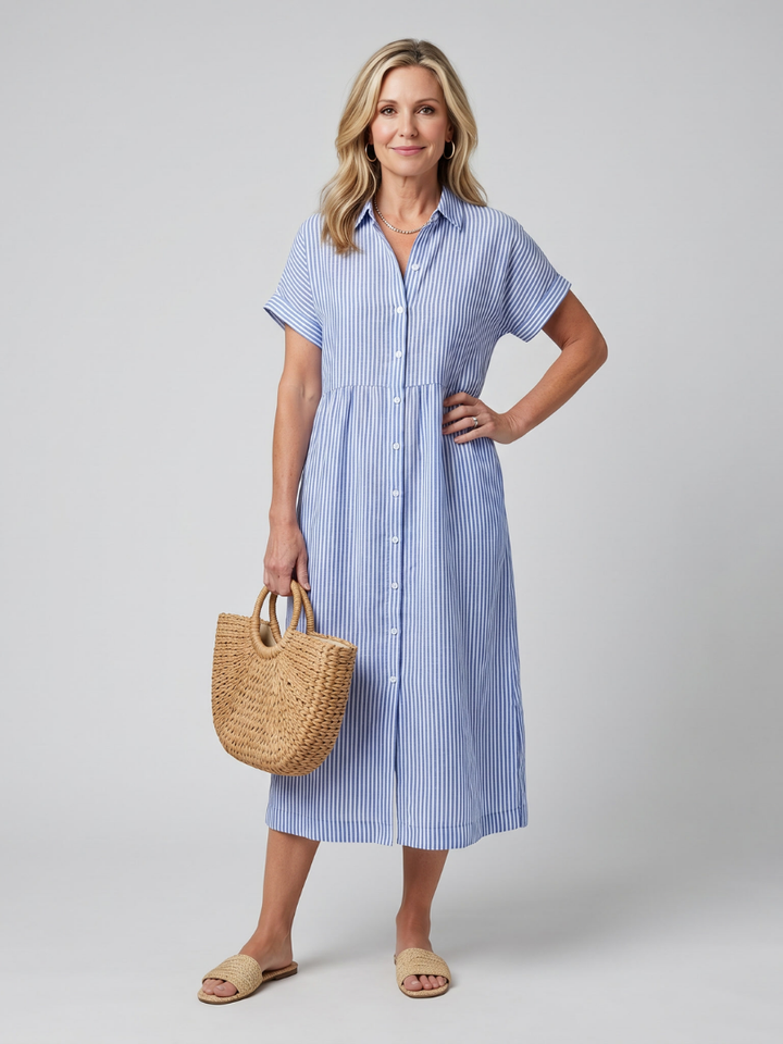 Women's striped short sleeve midi dress with button front, collared neckline, and pockets. Relaxed fit for summer style.